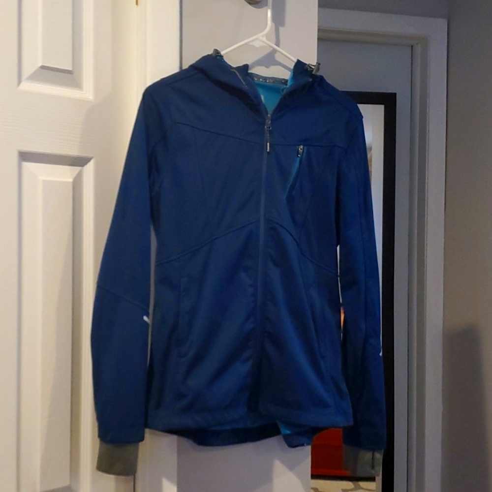 Dark blue Mondetta Activewear Jacket. There is visible wear and tear in photo.